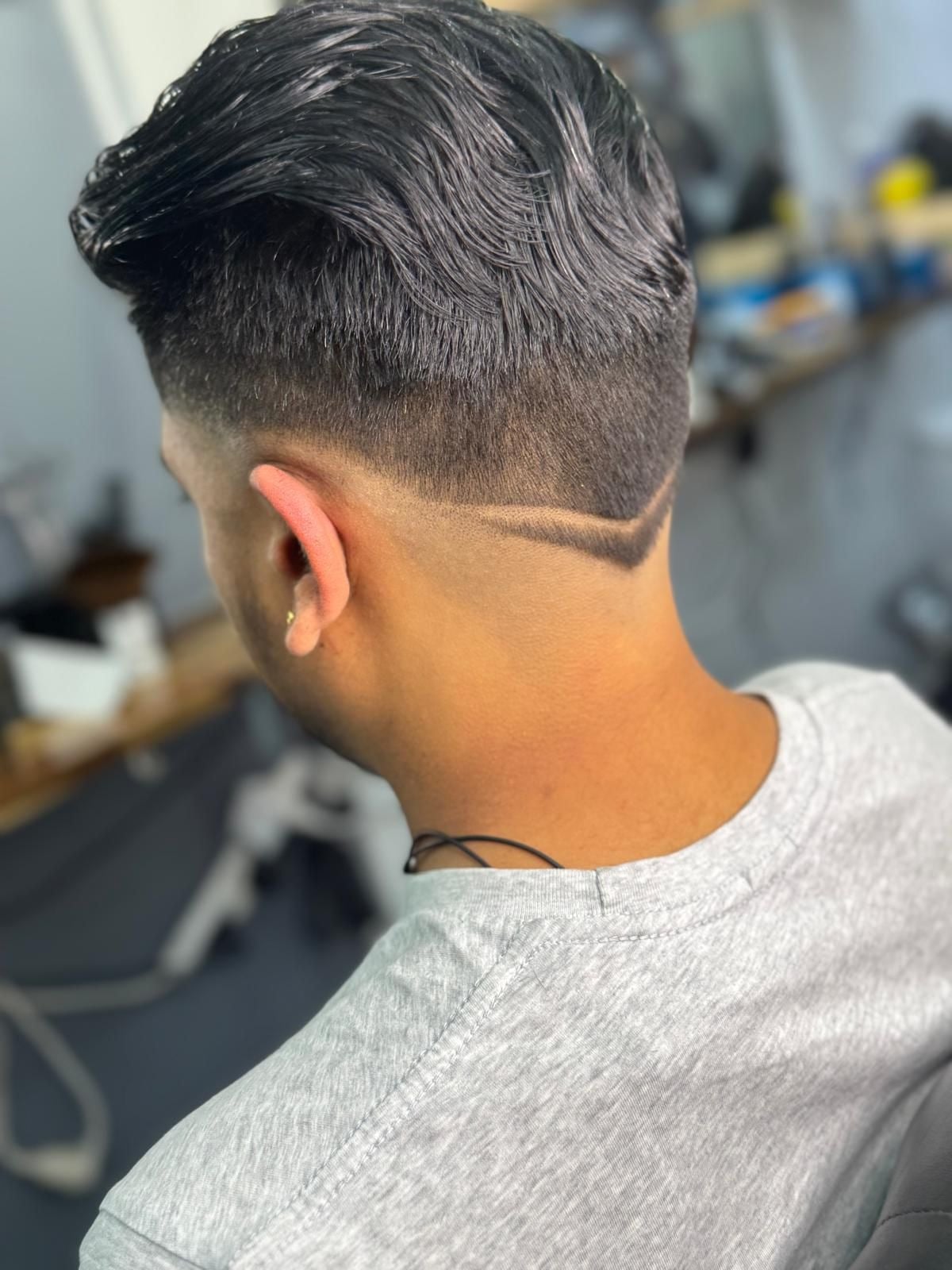 Back of the head showing a clean V shaped neckline design